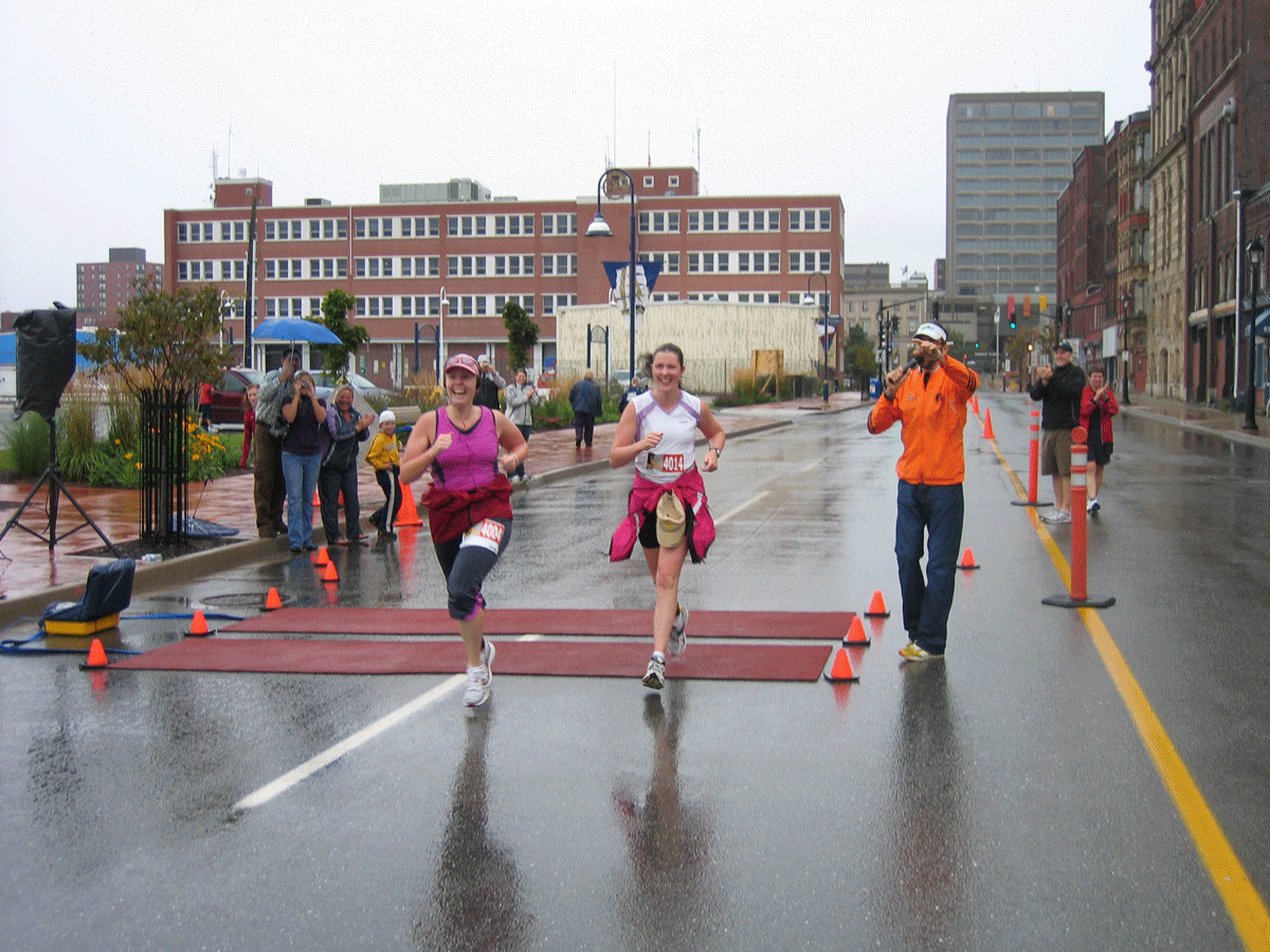 Carolyn Campbell, left, races the final stages of the 2008 Marathon By the Sea with her good friend Heather Davis.
